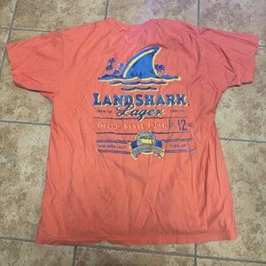 Orange/peach color shirt